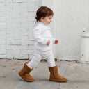 BEARPAW Toddler Elle Zipper Boot in Hickory worn in a cozy lifestyle setting, styled for everyday cold-weather kids' wear.