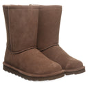 BEARPAW Women's Elle Short Boot in Earth worn on foot with casual cold-weather styling for a cozy everyday fall and winter look.