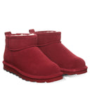BEARPAW Women's Shorty Boot in Cranberry worn on foot with casual cold-weather styling for a cozy everyday fall and winter look.