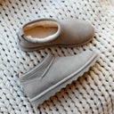 Model wearing BEARPAW Women's Super Shorty Boot in Mushroom with casual cold-weather styling for a cozy everyday look.