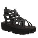 Bearpaw Women's Prominence Faux Leather Sandal in Black - front view