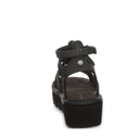 Bearpaw Women's Prominence Faux Leather Sandal in Black - outsole view