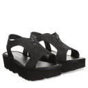 Bearpaw Women's Venice Faux Leather Sandal in Black - lifestyle on-foot