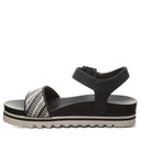 Bearpaw Women's Orion Faux Leather Sandal in Black and White - side view