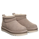 BEARPAW Women's Langly Boot in Stone worn on foot with casual cold-weather styling for an everyday fall and winter look.