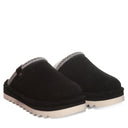 BEARPAW Women's Arden Slipper in Black worn on foot with relaxed casual styling, highlighting cozy everyday comfort.