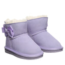 BEARPAW Toddler Saige Boot in Washed Lavender worn on foot with cozy cold-weather styling for everyday kids' wear.