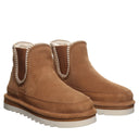 BEARPAW Women's Viola Boot in Cinnamon worn on foot with casual cold-weather styling for an everyday fall and winter look.