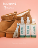 BEARPAW BearCoat Cleaning Kit shown beside tan suede boots