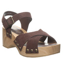 Bearpaw Colette sandal in chickory brown suede angle view featuring wooden platform sole, crossover straps and adjustable buckle closure