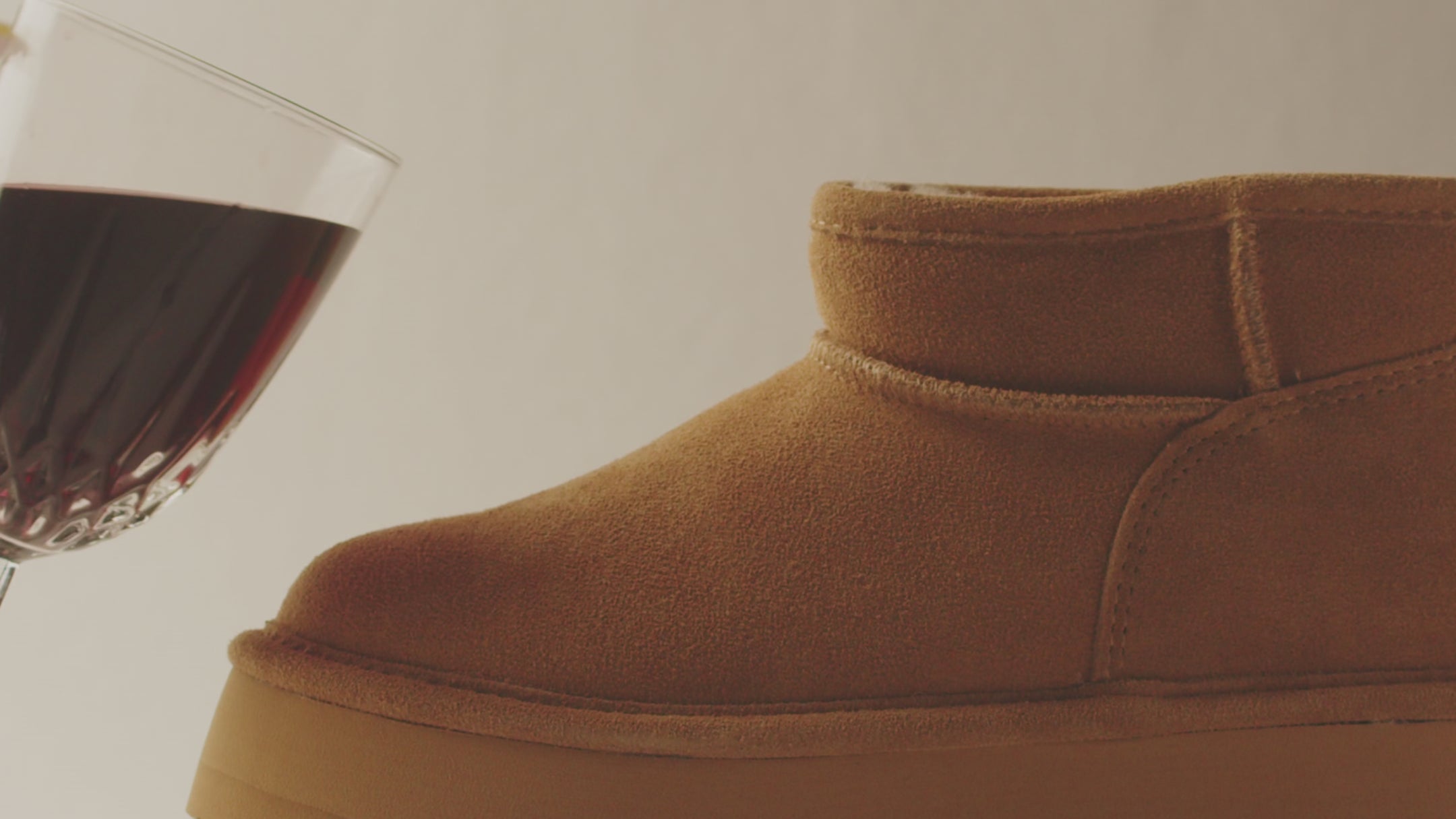 Bearpaw BearCoat water and stain repellent video demonstrating liquid beading off a treated Bearpaw shoe.